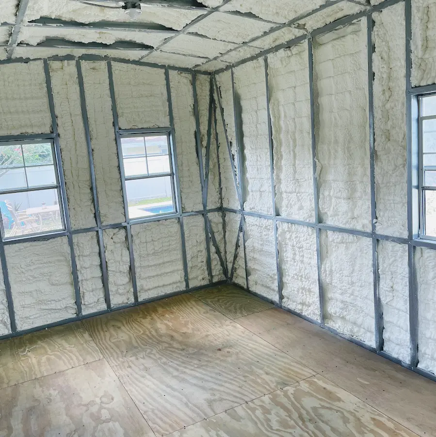 Closed-cell spray foam insulation applied to wall cavities in a residential project in Seattle